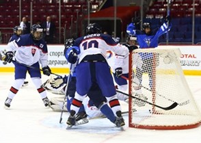 CHELYABINSK, RUSSIA - APRIL 19: Finland's Leevi Aaltonen #12 (not shown) scores a first period goal against Slovakia's Samuel Hlavaj #30 while Nicolas Fereny #11 and Martin Bucko #10 look on during preliminary round action at the 2018 IIHF Ice Hockey U18 World Championship. (Photo by Andrea Cardin/HHOF-IIHF Images)

